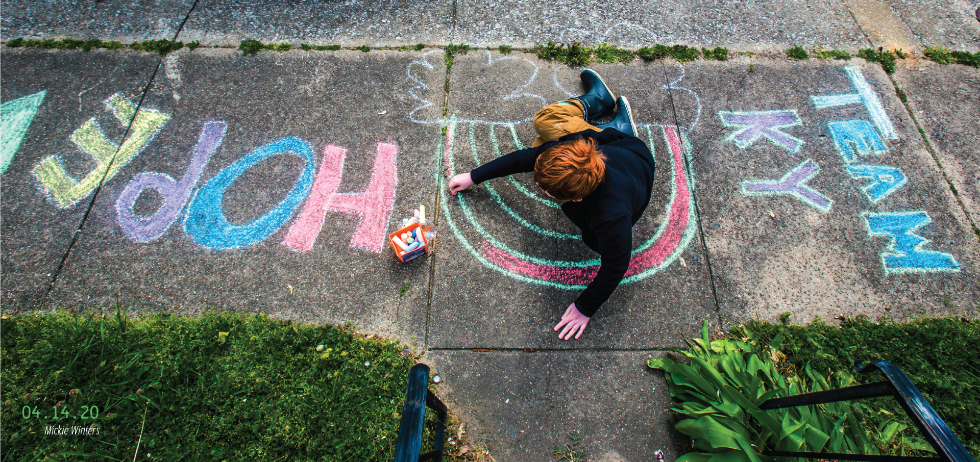 A kid drawing with sidewalk chalk. 04.14.2020, by Mickie Winters